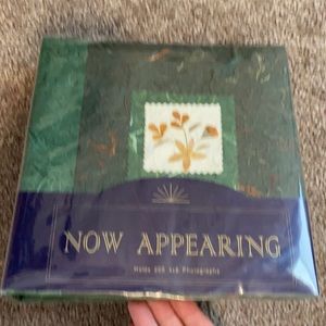 Photo album holds 200 4 by 6 photos - brand new